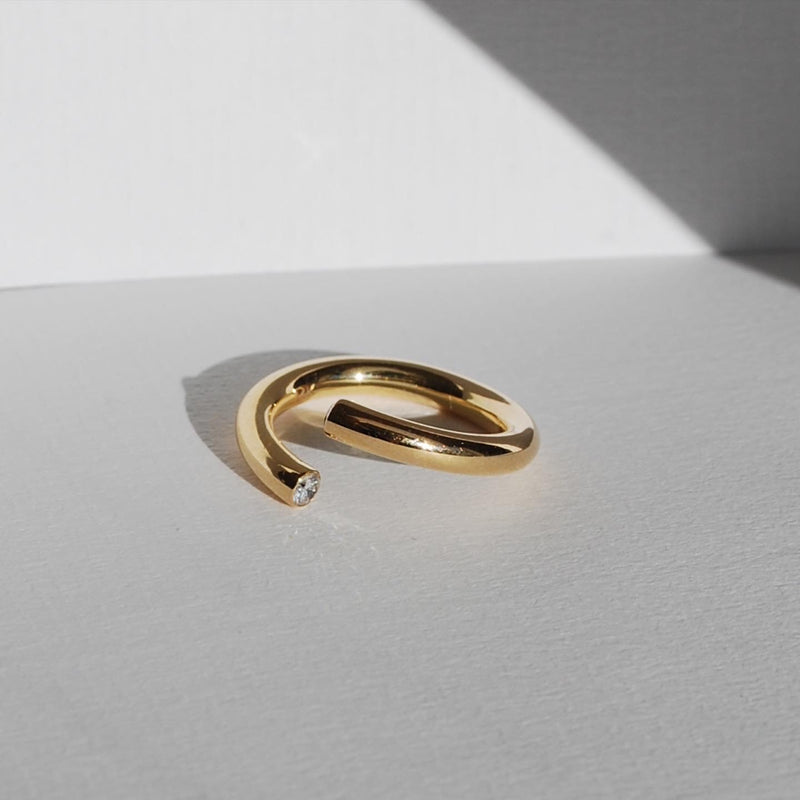 Twisted Gold Ring with Hidden Gems