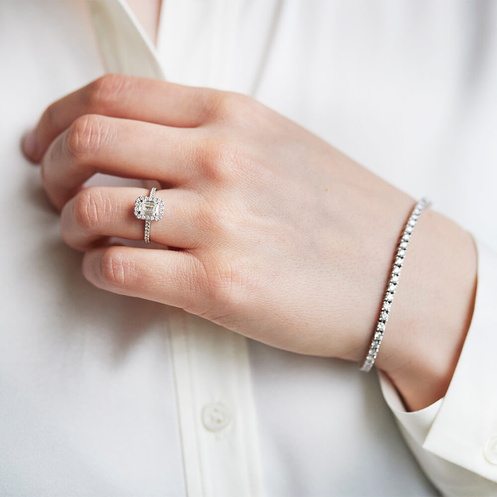 Emerald Cut Diamond Solitaire Ring with Halo