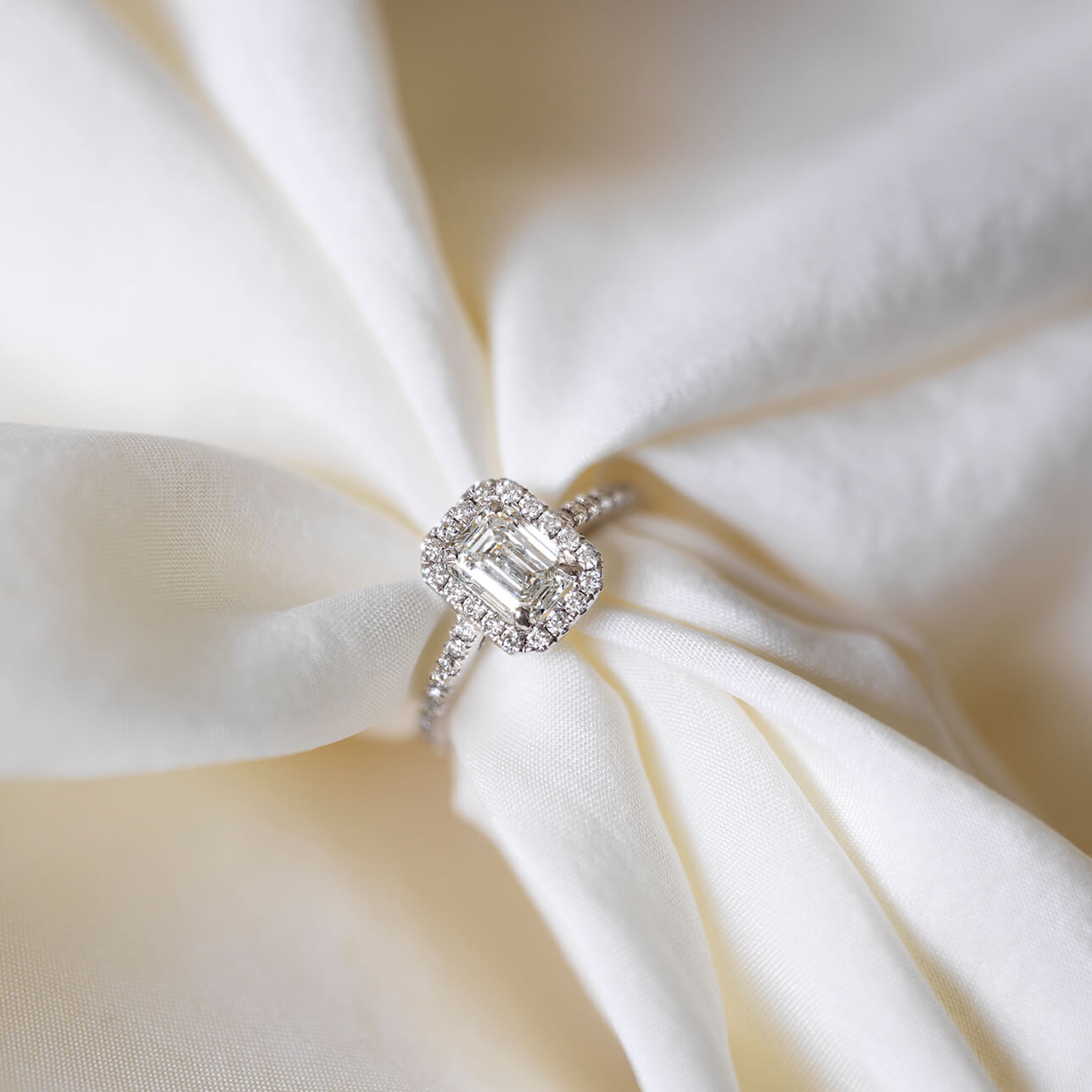 Emerald Cut Diamond Solitaire Ring with Halo